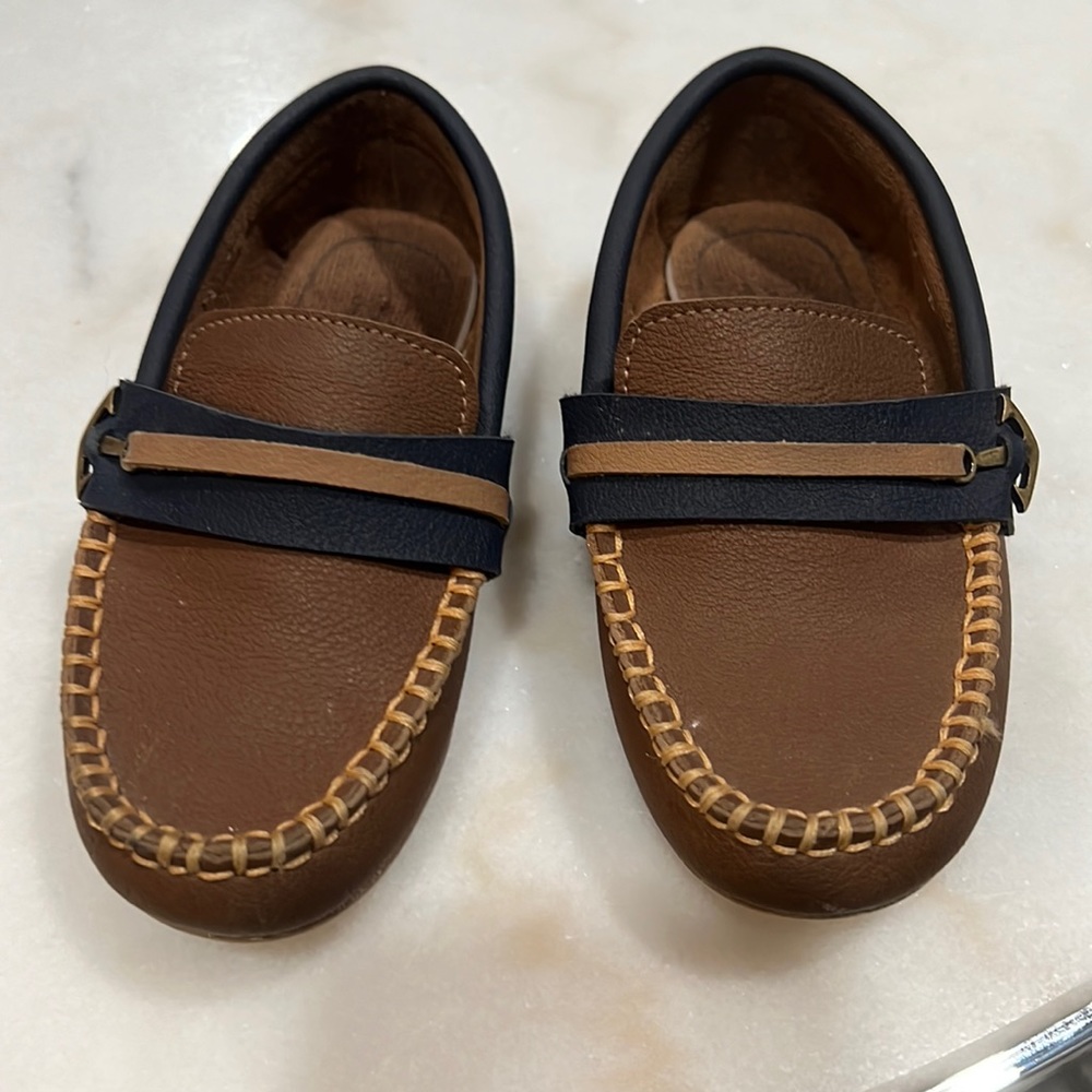 Boys dress shoes, navy blue with a dark brown. Work only a few times. Easy slip